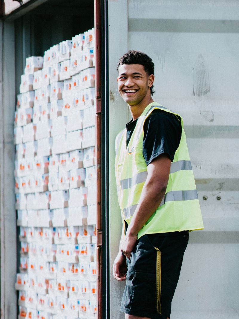 An LSL crew member at the door of a loaded container