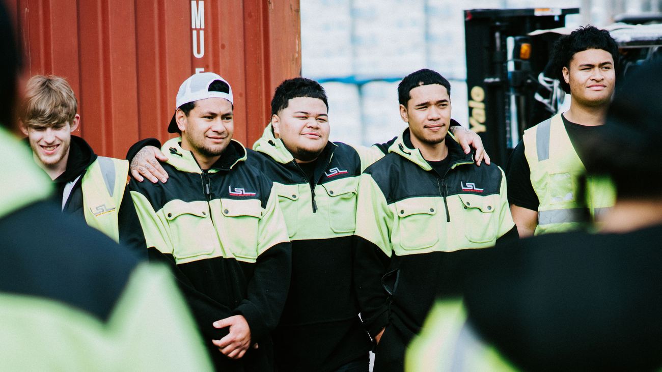 LSL crew members together in the yard